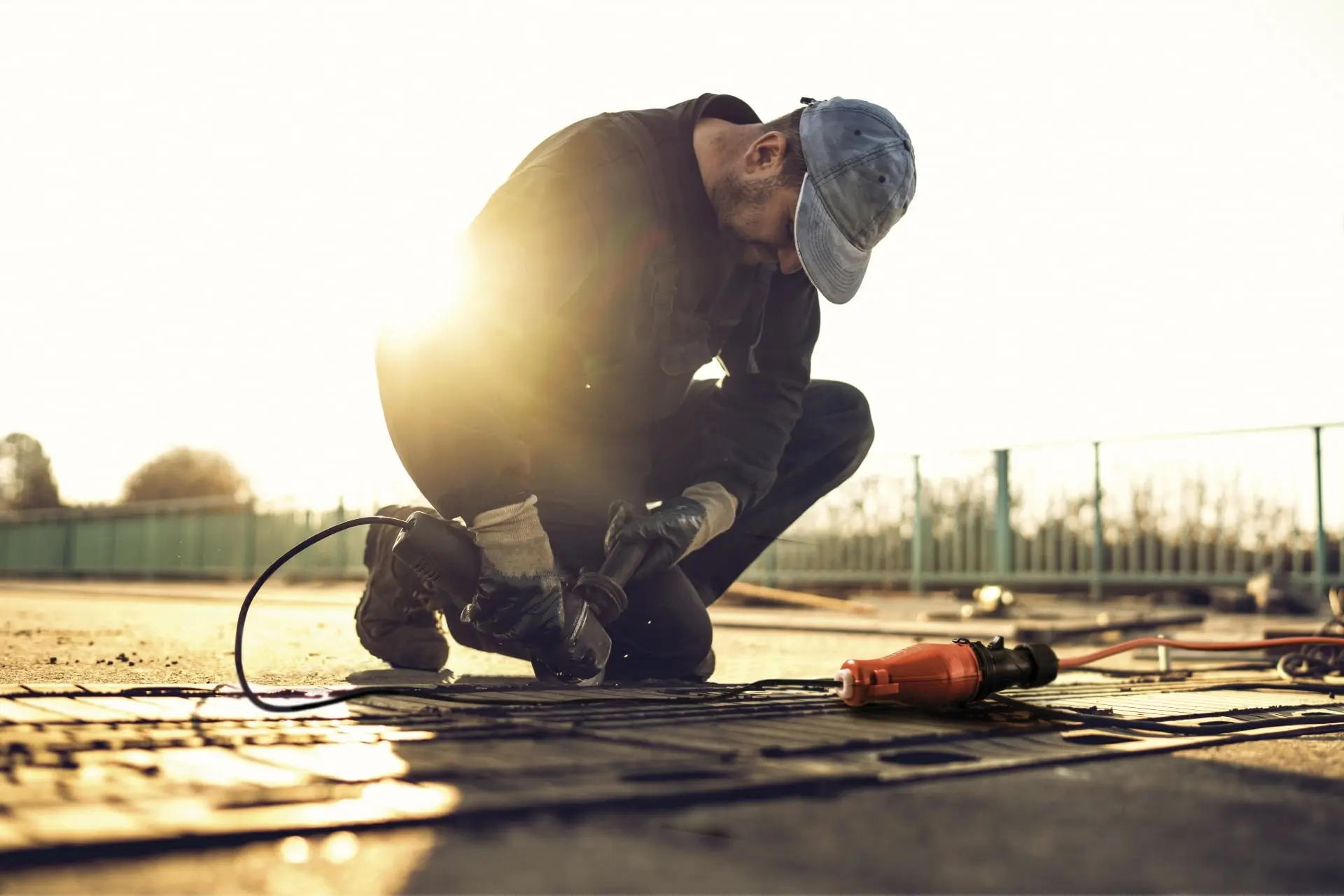 Construction worker using Easy Life's weather proof extension cord.